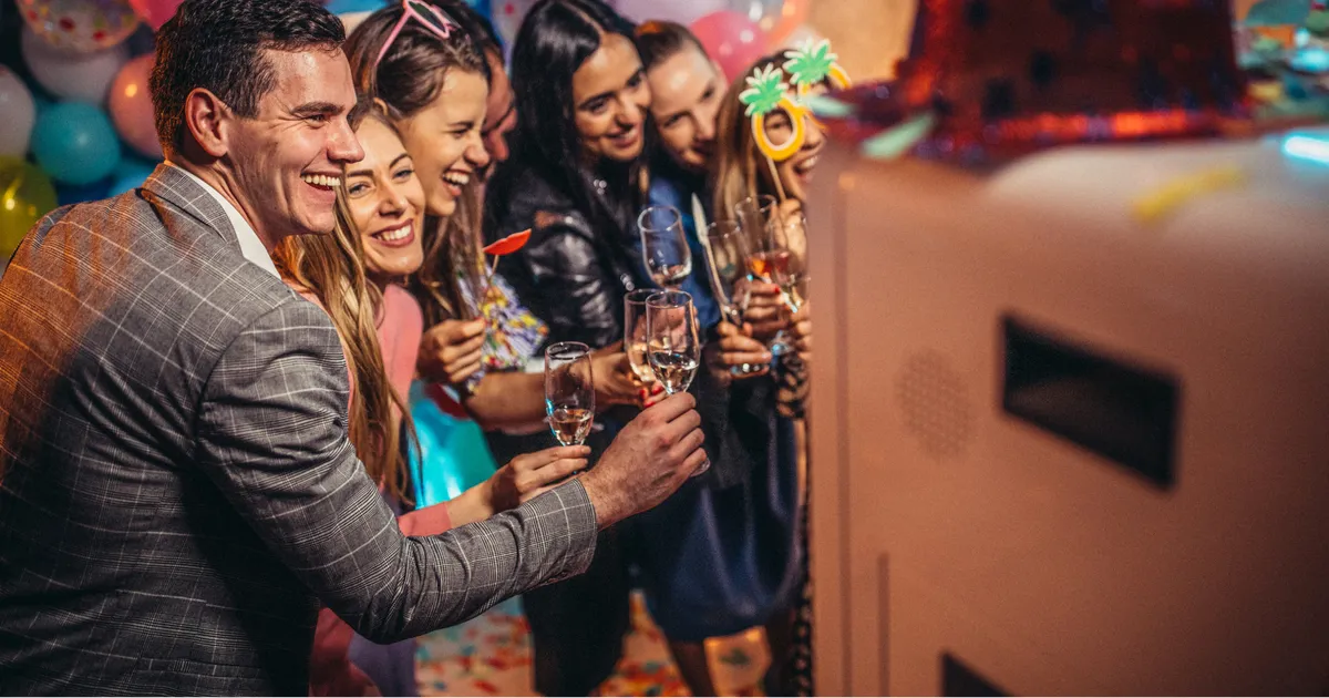 Guests using a photo booth at an event