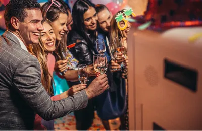 Guests using a photo booth at an event