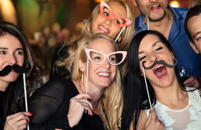 Photo booth guests at a wedding reception