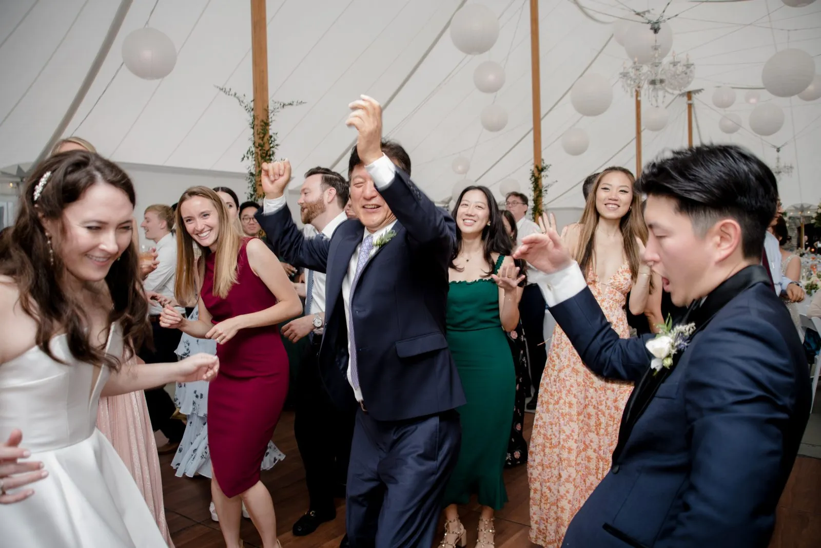Guests and the couple on the dance floor at Allison and Charles’s Taughannock Falls wedding