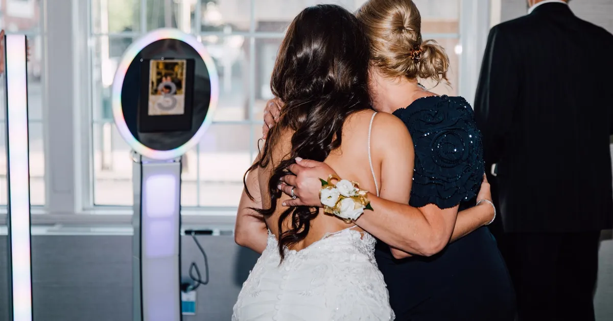 Photo booth and photographer coverage at an event