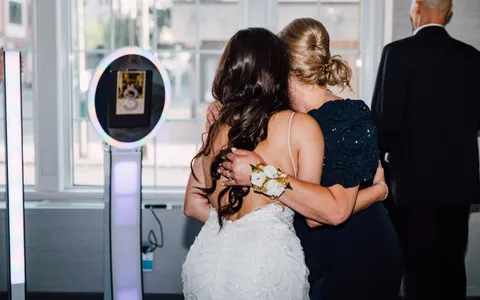 Photo booth and photographer coverage at an event
