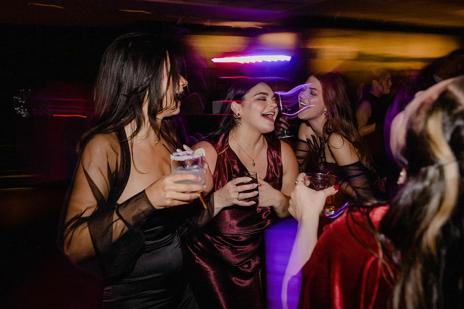 Hannah and Chris and guests on the dance floor at their winter wedding at the Inns of Aurora