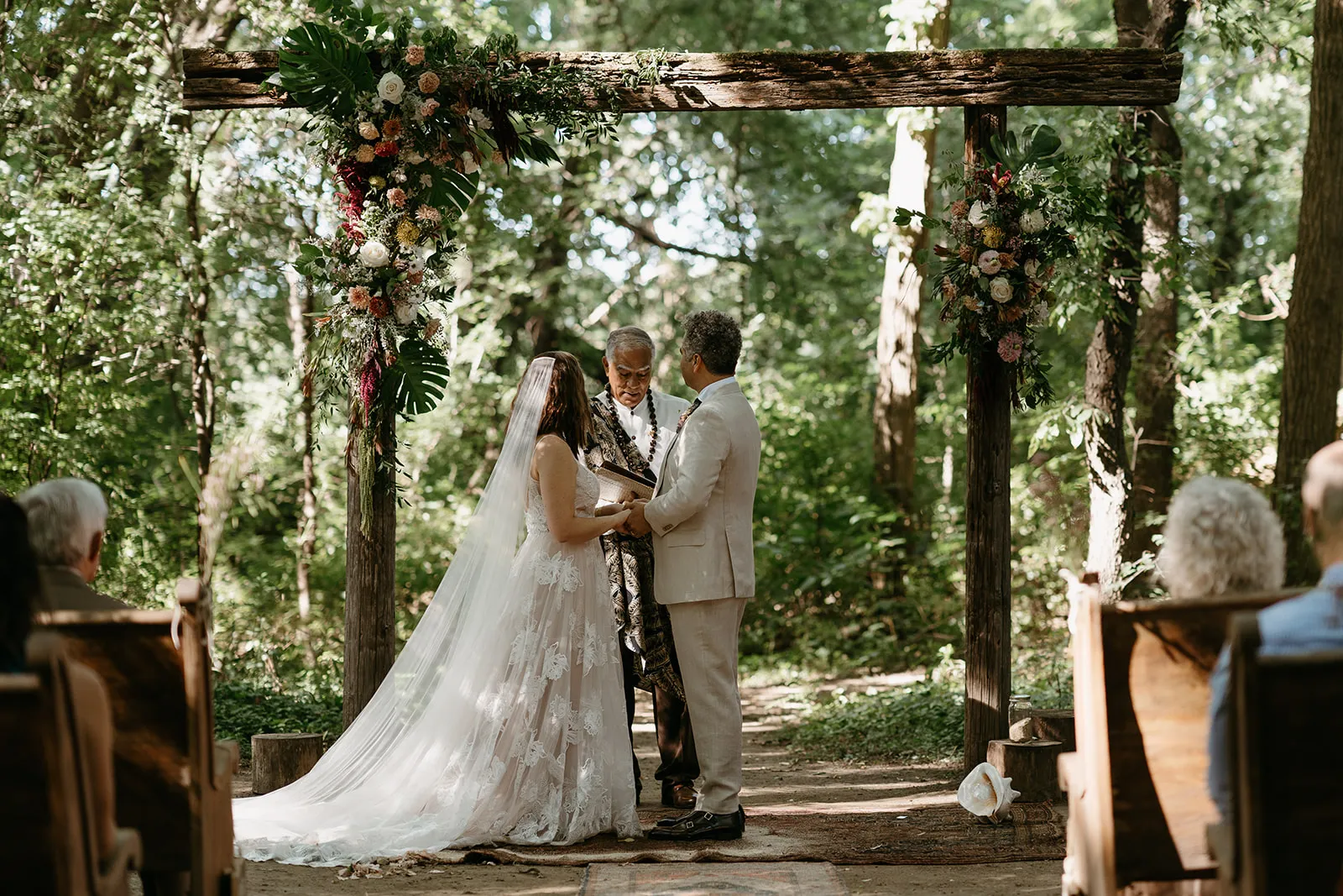Cassie and Liko during their wedding ceremony at The Kester Homestead in Skaneateles
