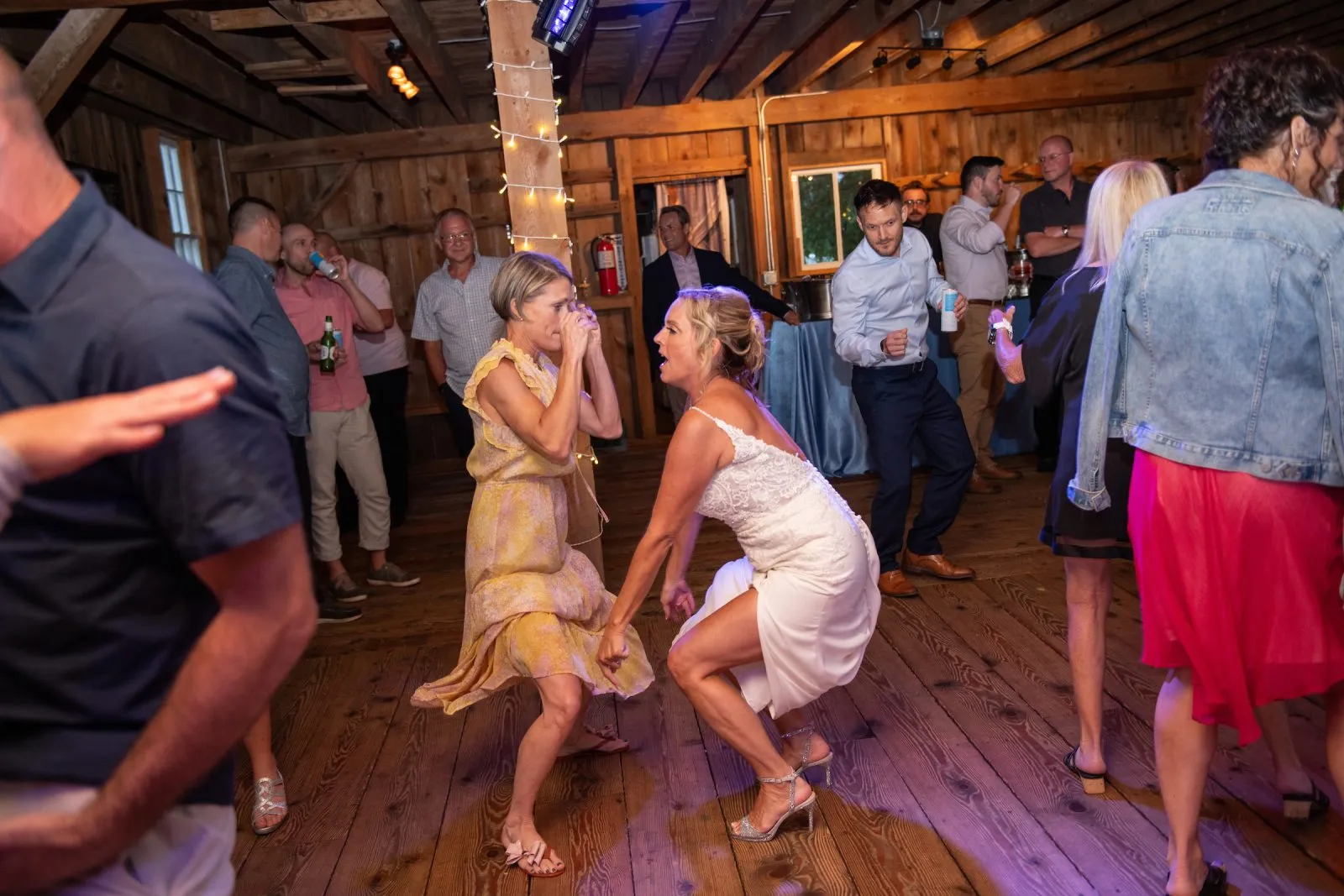 Guests dancing at Cynthia and Chris’s wedding reception at Gratitude and Grace