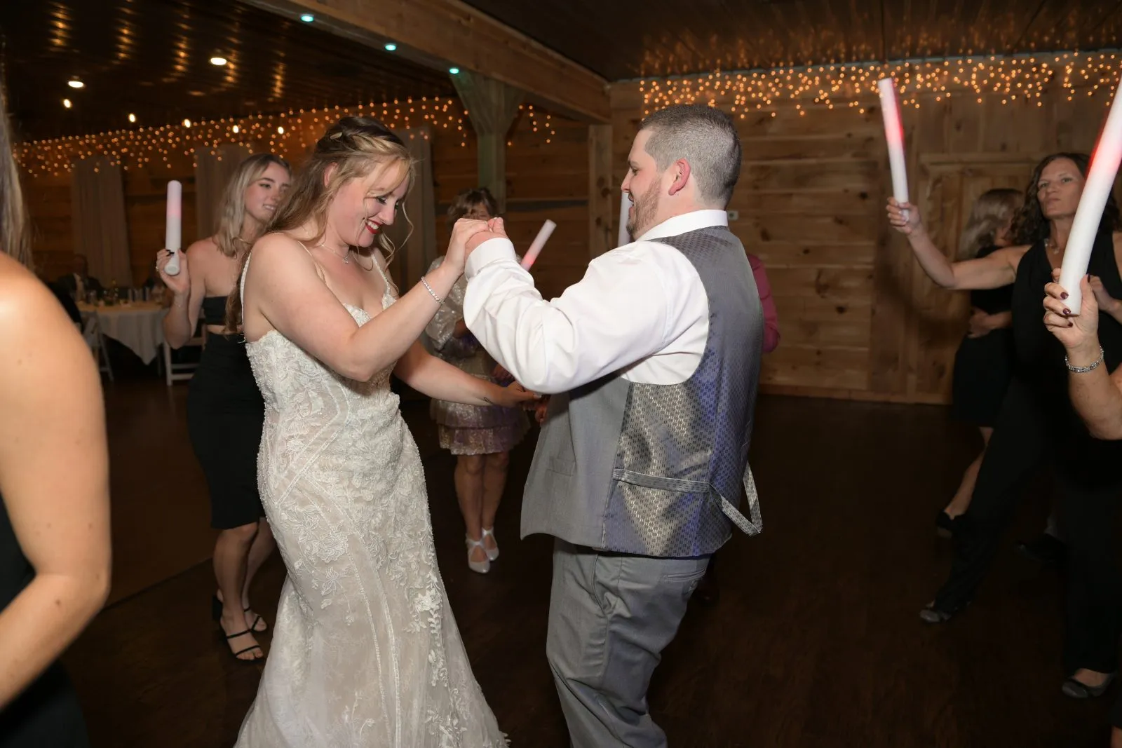 Crystal and Brian celebrating their fall wedding at Apple Station Winery in Cayuga NY