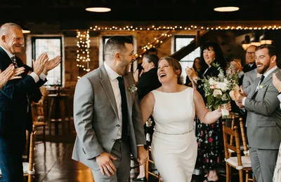 Bridal party making a grand entrance at a wedding reception