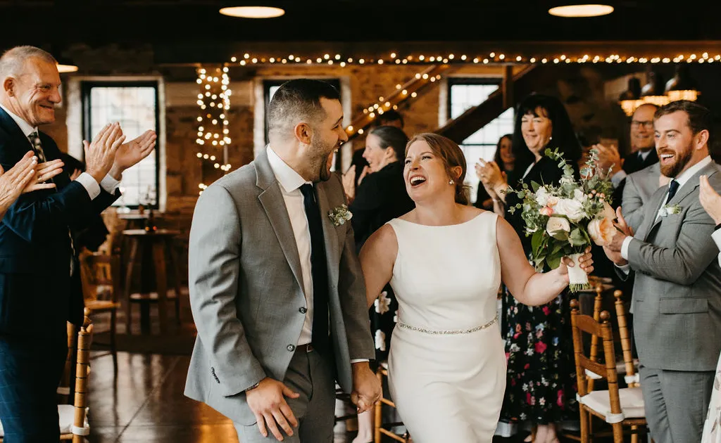 Bridal party making a grand entrance at a wedding reception