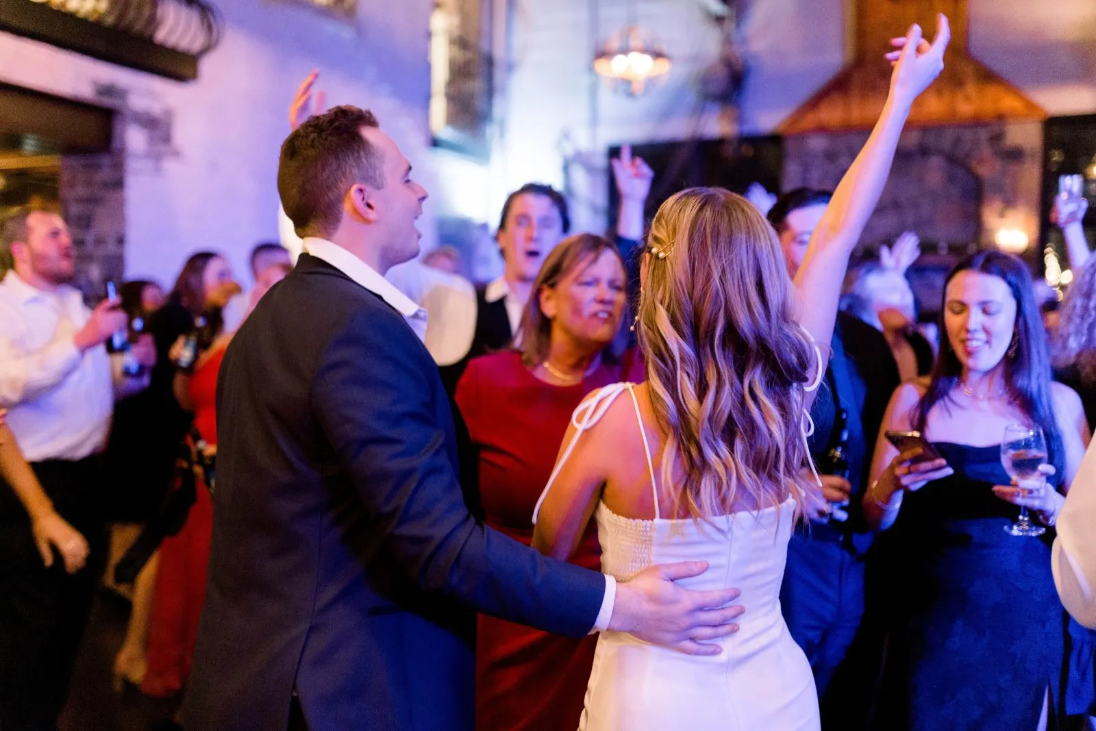 Meg and Brian celebrating at their spring wedding at The Sinclair of Skaneateles