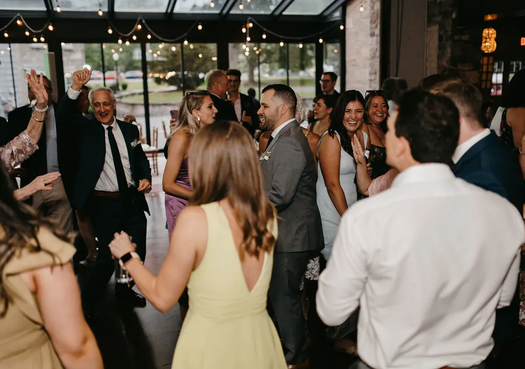Molly and Charlie and guests on the dance floor at The Sinclair of Skaneateles