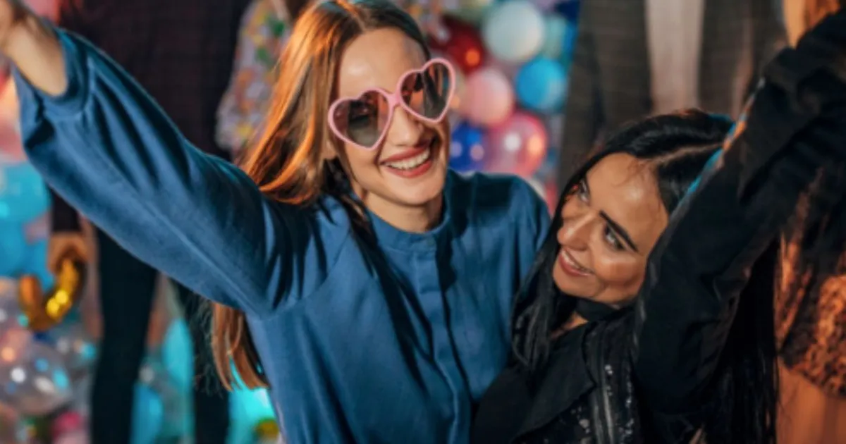 Guests having fun at an event photo booth