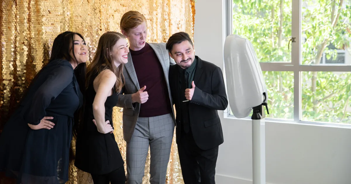 Photo booth guests at a corporate event