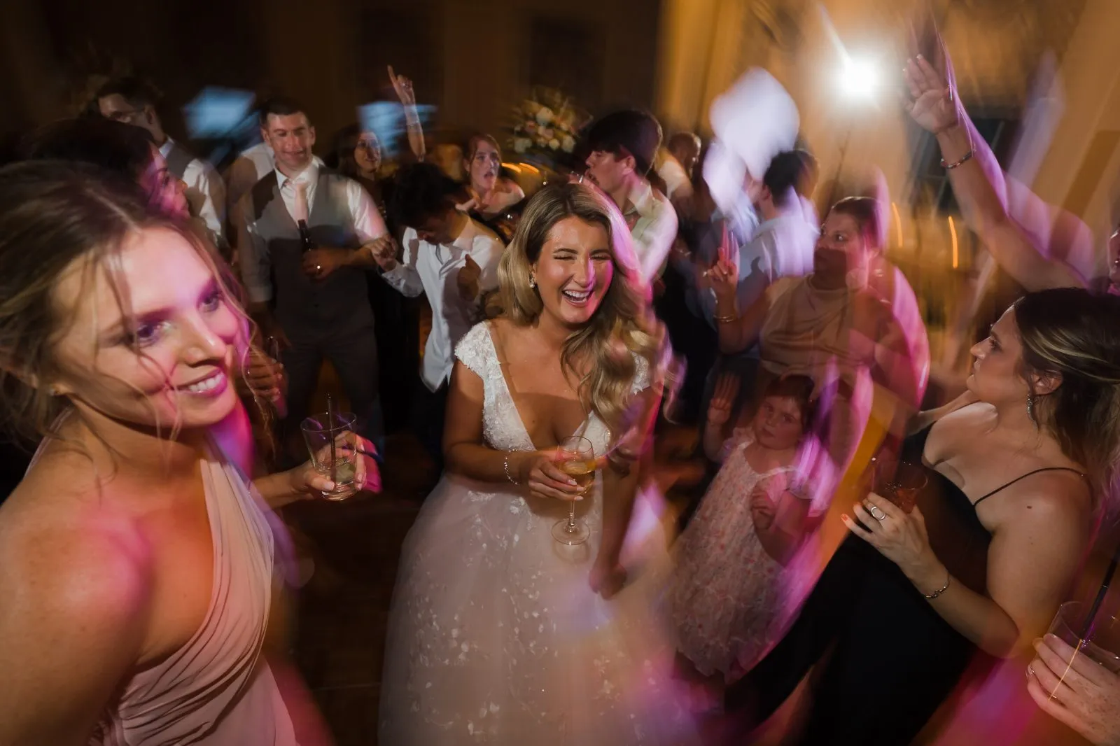 Melissa and Jeremy and guests on the dance floor at The Otesaga Resort wedding
