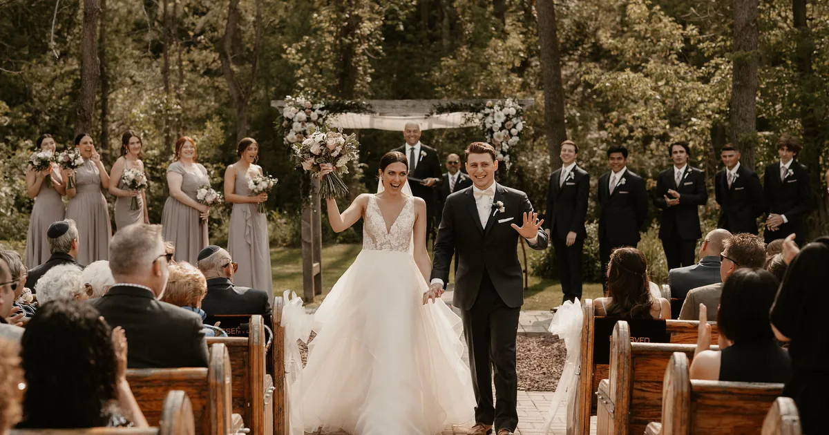 Gabrielle and Justin at their wedding at The Sinclair of Skaneateles