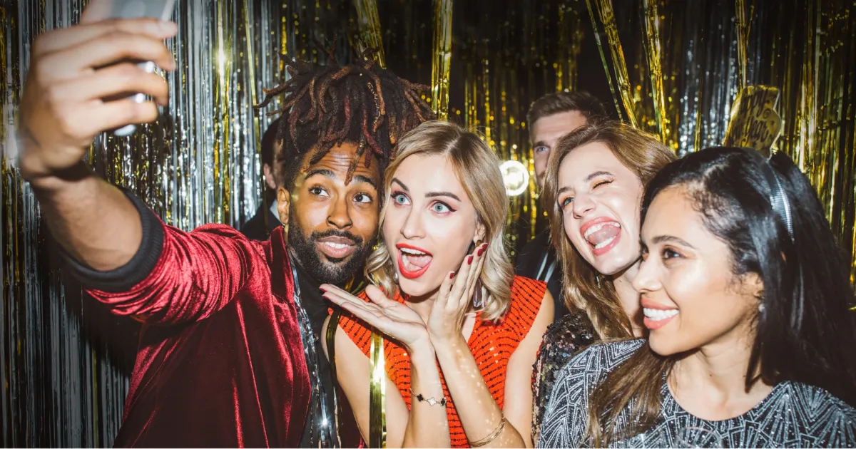 DIY photo booth setup with a tripod and props
