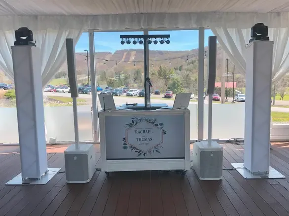elegant tv booth design for a wedding dj booth