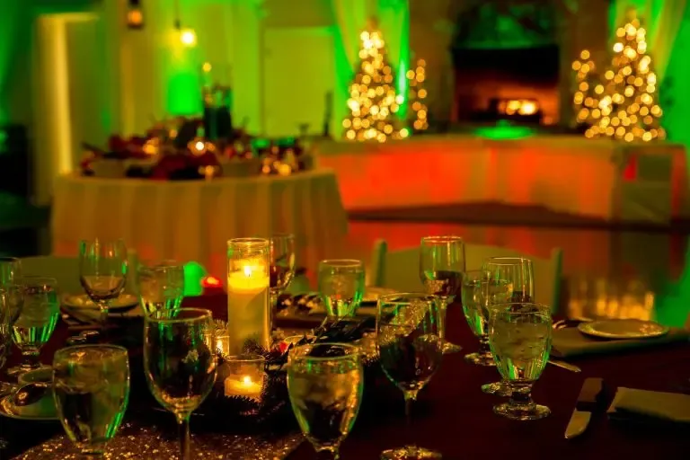 dinner table at wedding with glasses and lighting