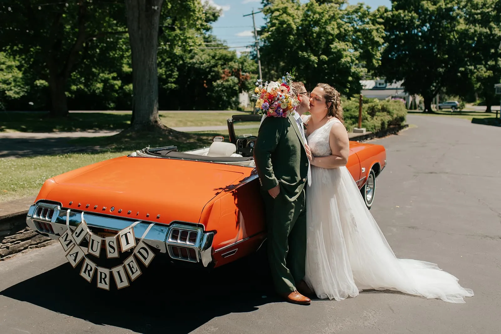 Katelyn and Eric celebrating at their Independence Day weekend wedding