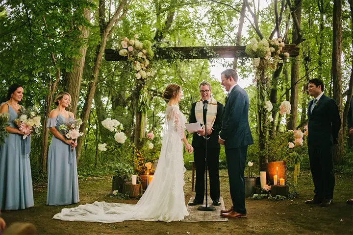 small outdoor wedding with nature theme showing bride and groom