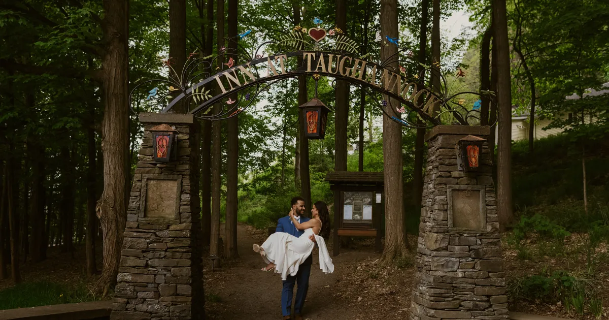 Sydney and Brady at their wedding at the Inn at Taughannock Falls