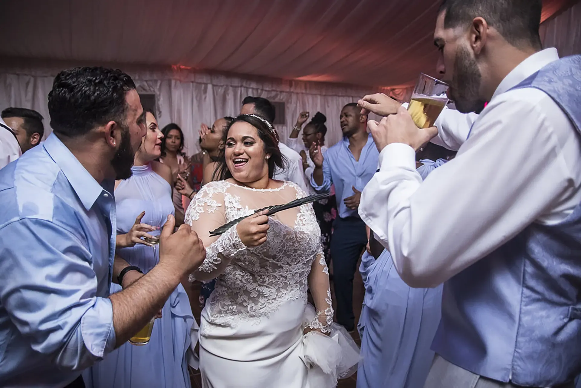 wedding reception party with bride and friends
