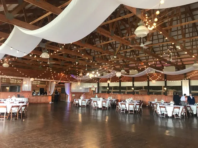 Samantha and Joe sharing a moment during their Old Hickory Farm reception